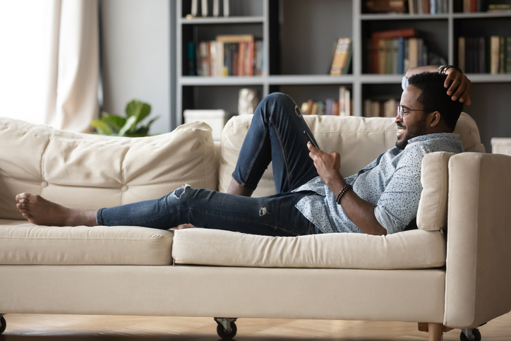 Man relaxing watching video